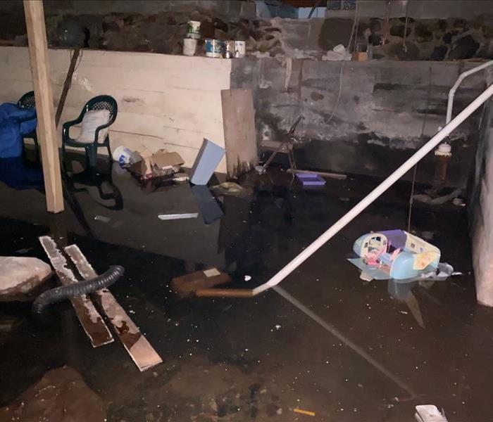This flooded basement was caused by a floor drain blockage.